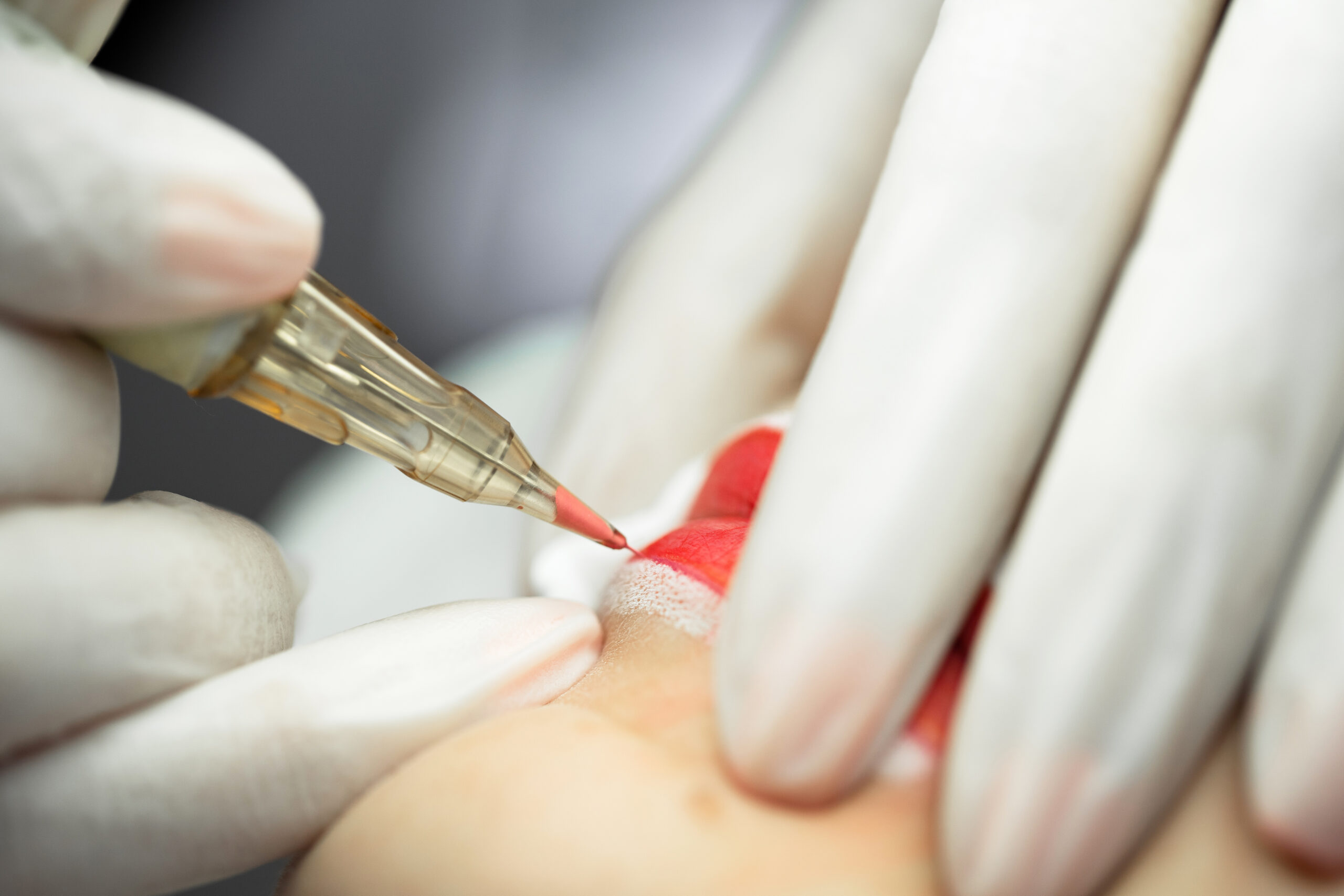 Details of professional permanent makeup procedure - lip blushing